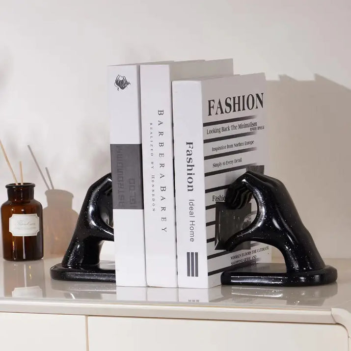 Black hand-shaped bookends.