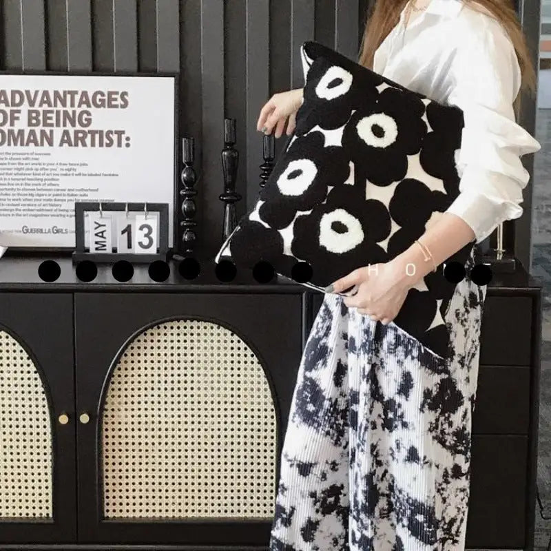 Black and white floral pillow.