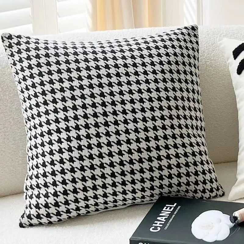 Houndstooth patterned throw pillow.