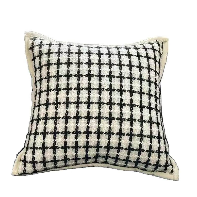 Black and white checkered throw pillow.