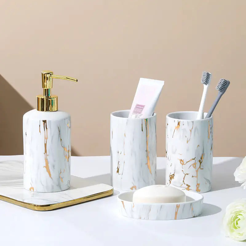 Marble-patterned bathroom accessory set.