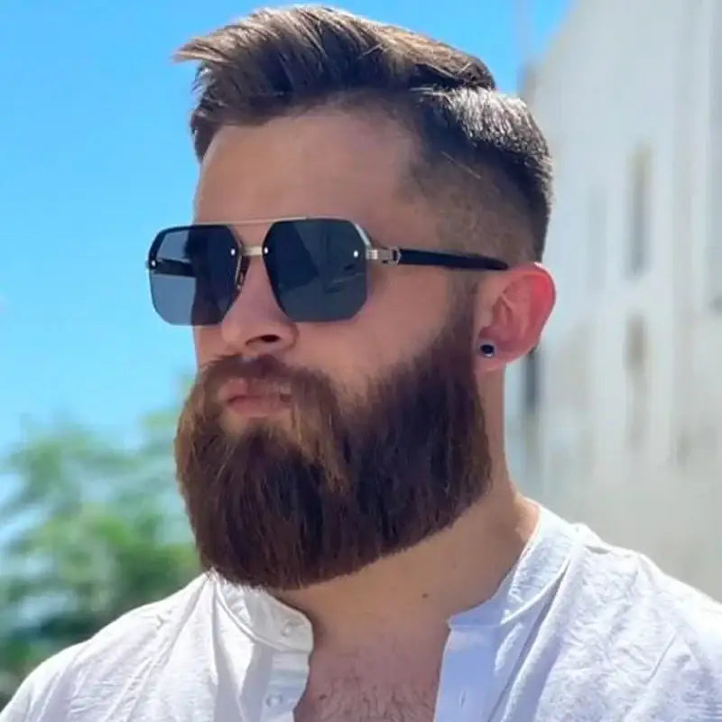Man with beard and sunglasses.