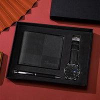 Black gift set with wallet, pen, and watch.