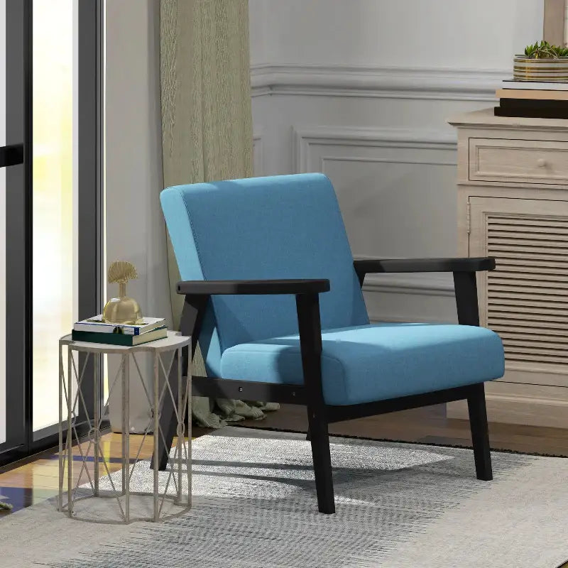 Blue upholstered mid-century modern accent chair with dark wood frame for stylish seating