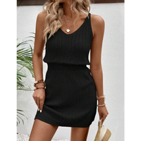 Black knit mini dress.