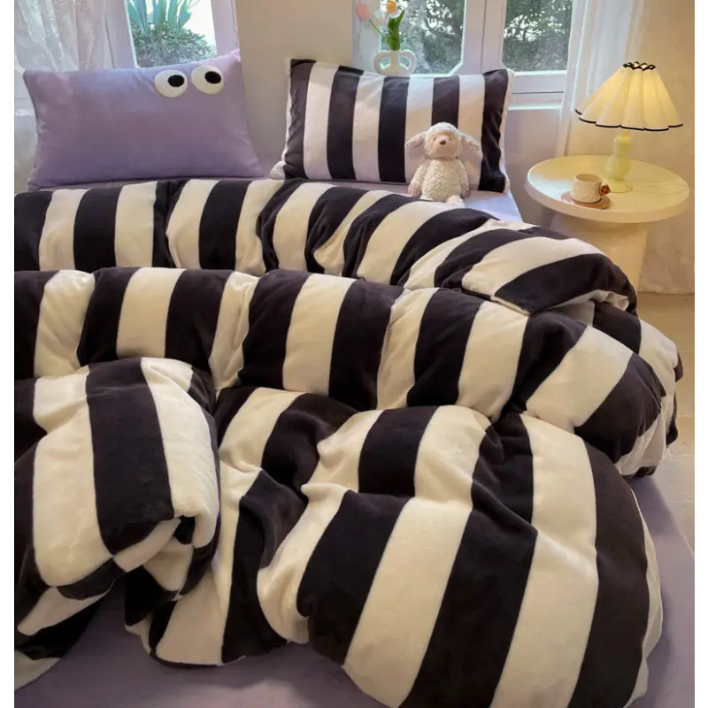 Black and white striped bedding.