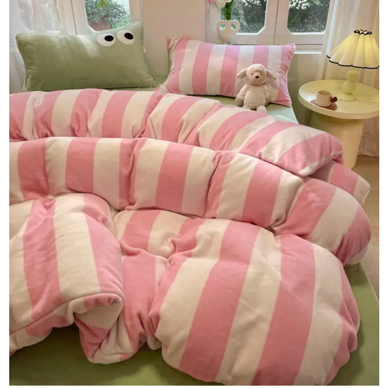 Pink and white striped bedding.