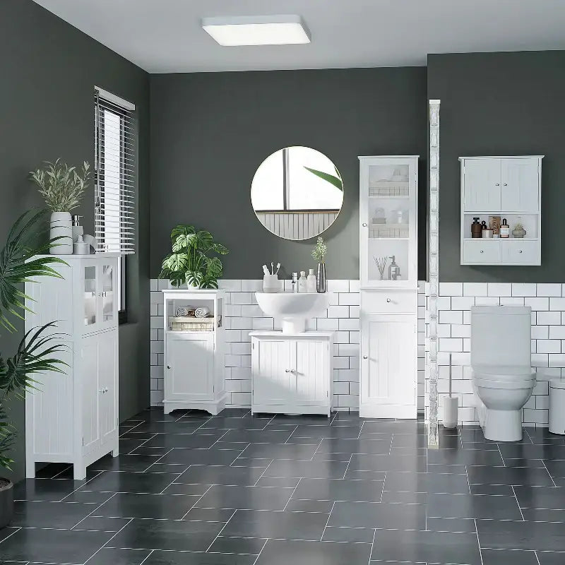 Bathroom with white cabinets.