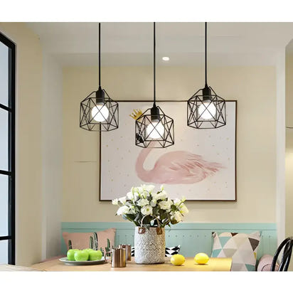 Three geometric pendant lights.