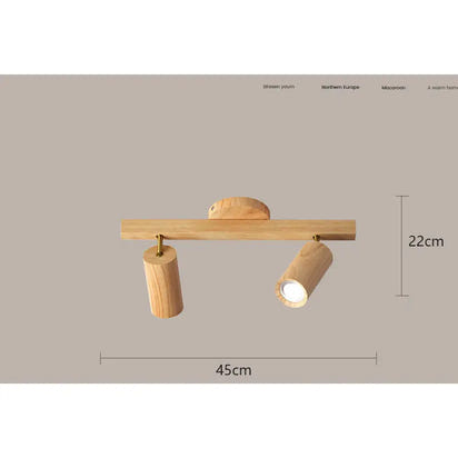 Wooden two-light spotlight fixture.