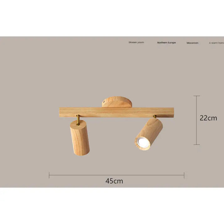 Wooden two-light spotlight fixture.