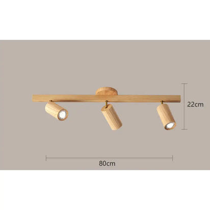 Wooden three-light ceiling fixture.