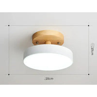 Round white and wood ceiling light.