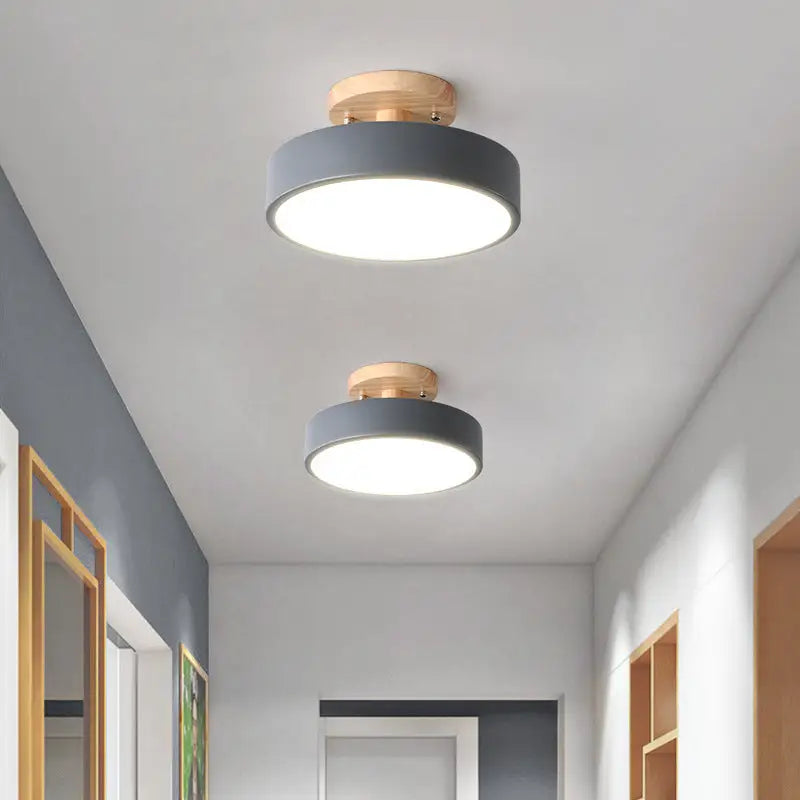 Two gray and wood ceiling lights.