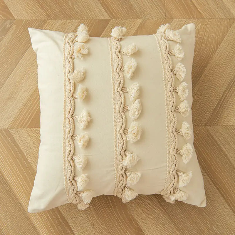 Cream-colored decorative pillow with tassel accents for Morocco Style Home Throw Pillow