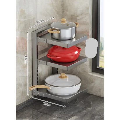 Three-tiered metal pot rack on multi-layer kitchen shelves for organized cooking storage