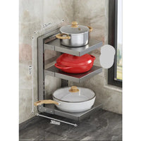 Three-tiered metal pot rack on multi-layer kitchen shelves for organized cooking storage