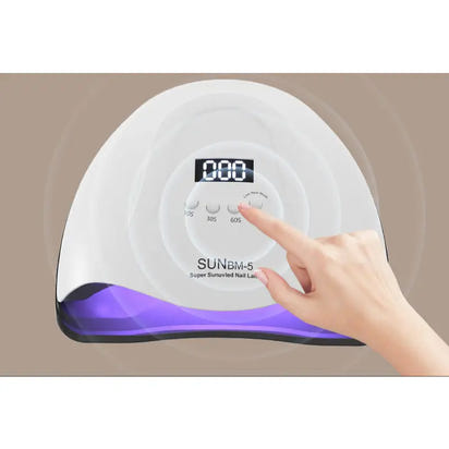 White nail lamp with digital display.