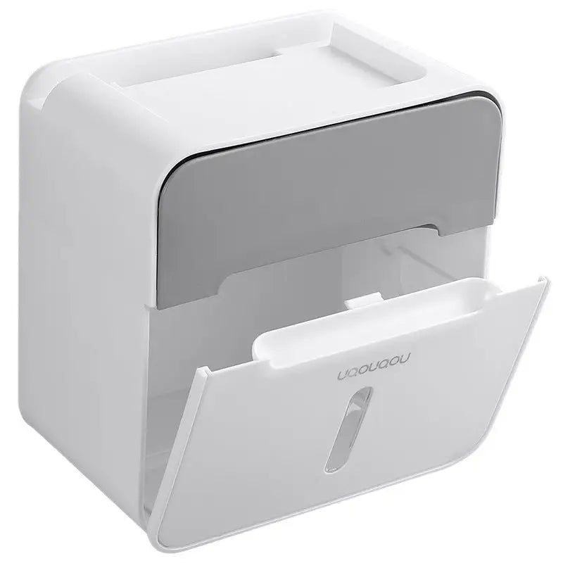 White and gray tissue box.