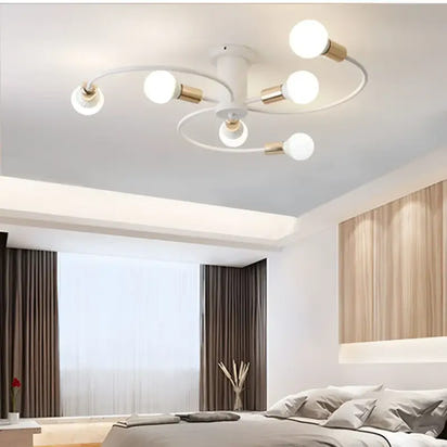 White and gold spiral ceiling light.