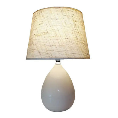 White teardrop lamp with textured shade.