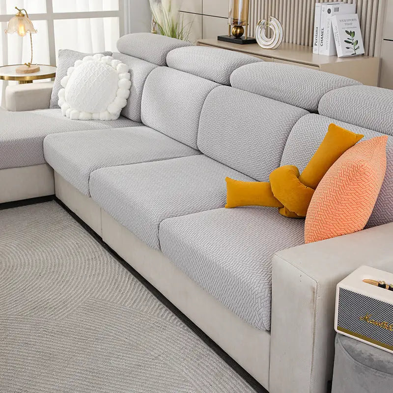 Sectional sofa with textured gray covers showcasing the Nordic Fabric Elastic Twill Couch Cover