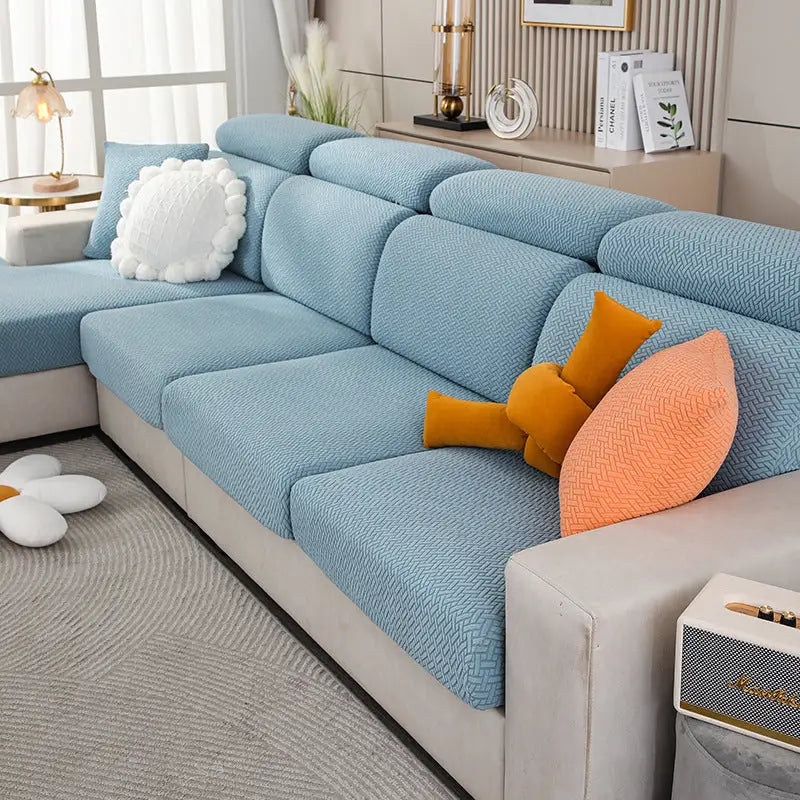 Blue textured sectional sofa with Nordic Fabric Elastic Twill Couch Cover for a stylish look
