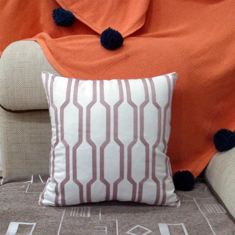 Geometric patterned throw pillow.