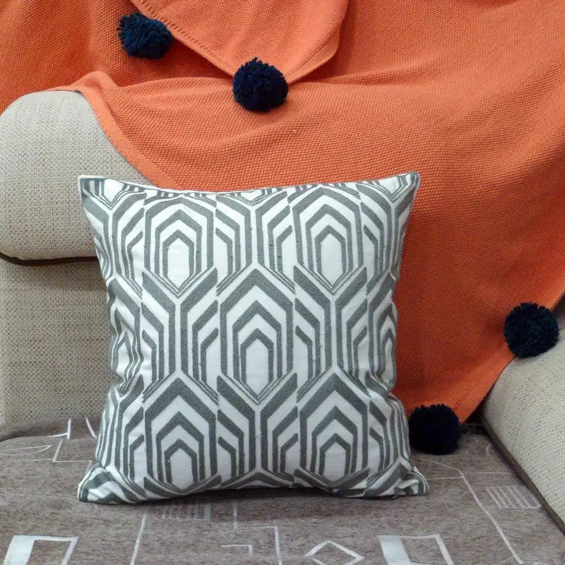 Geometric patterned throw pillow.