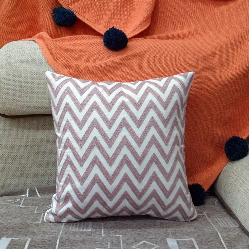 Zigzag patterned throw pillow.