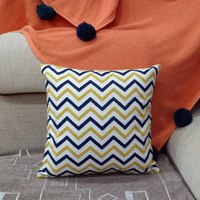 Zigzag patterned throw pillow.