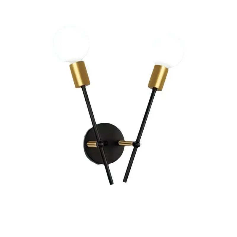 Two-bulb black and gold wall sconce.