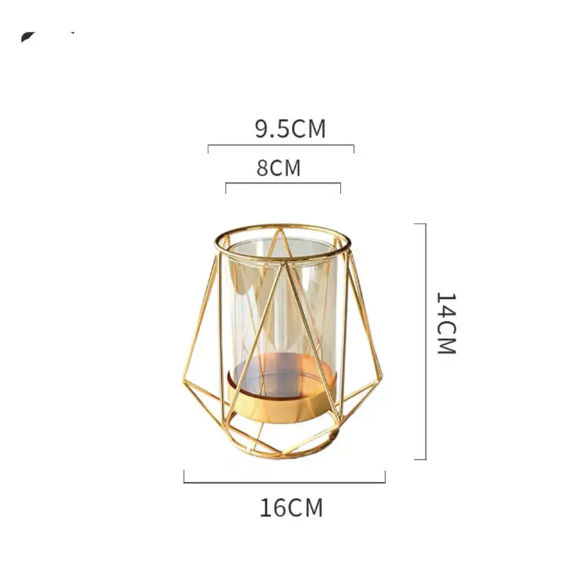 Gold geometric candle holder with glass insert.