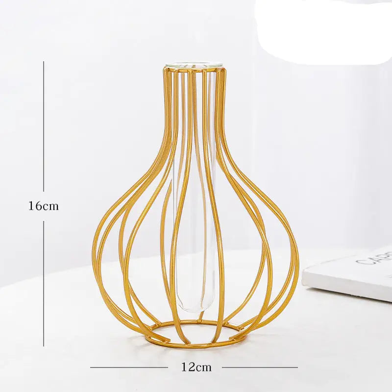 Gold wire-framed glass vase.