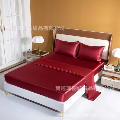Red satin bedsheet set.