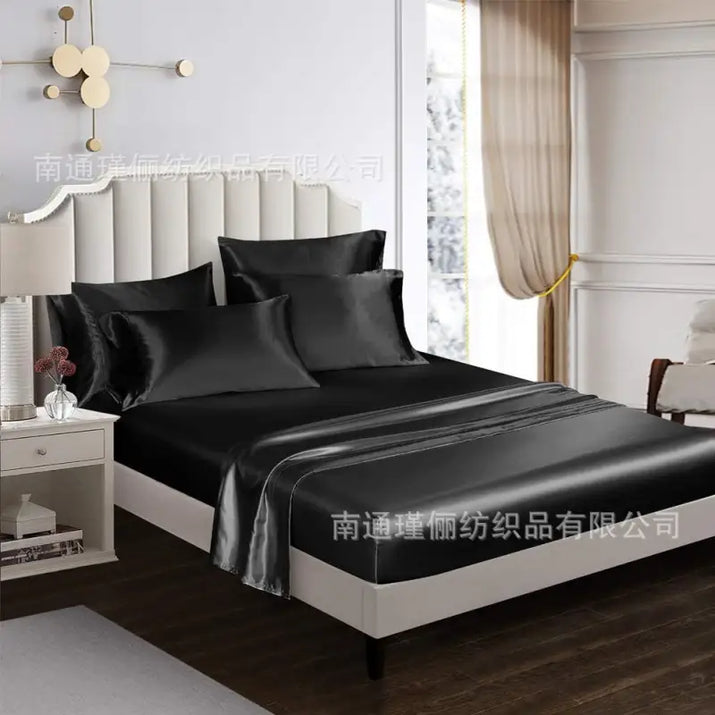 Black satin bedsheet set.