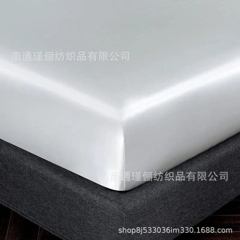 White satin bedsheet.