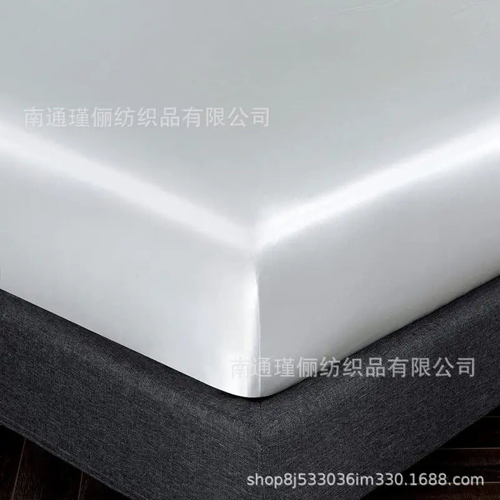 White satin bedsheet.