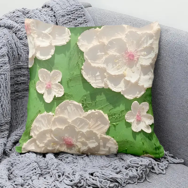 Green floral textured pillow.