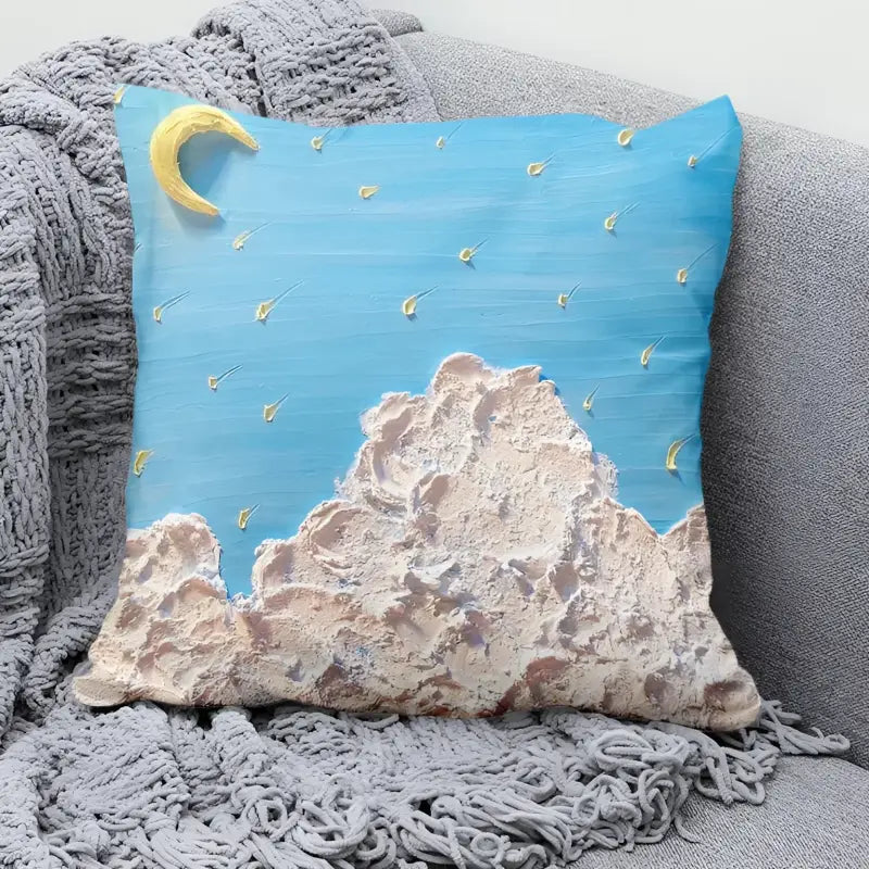 Textured moon and clouds pillow.