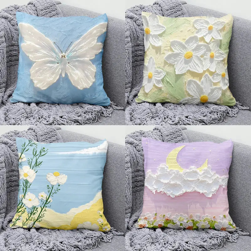 Four decorative throw pillows.