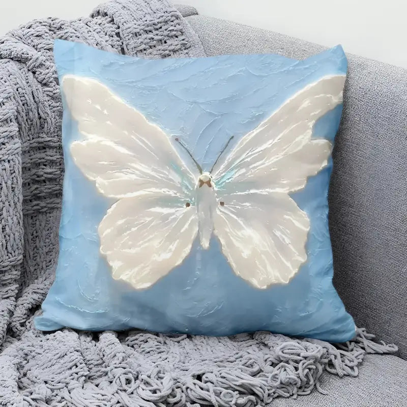 Light blue butterfly pillow.