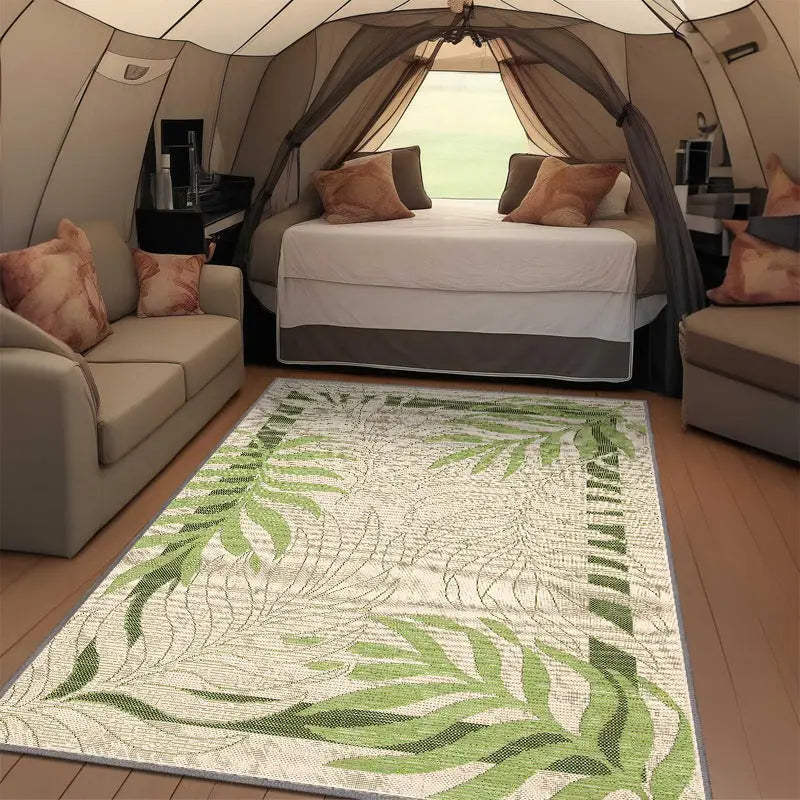 Green leaf patterned outdoor living room mat for outdoor living spaces