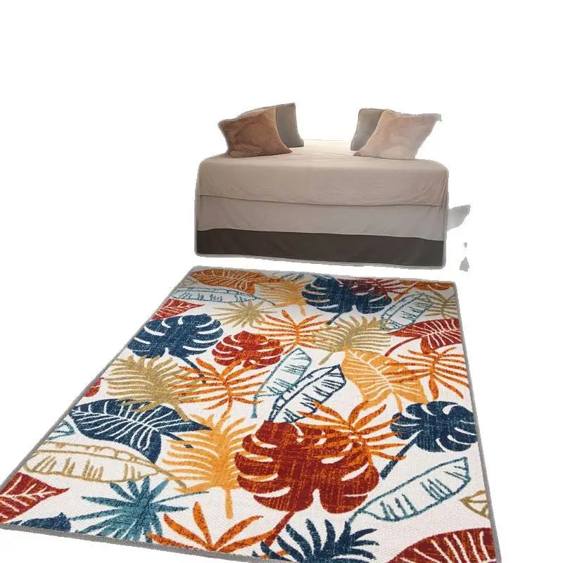 Tropical leaf patterned outdoor living room mats for stylish outdoor living spaces