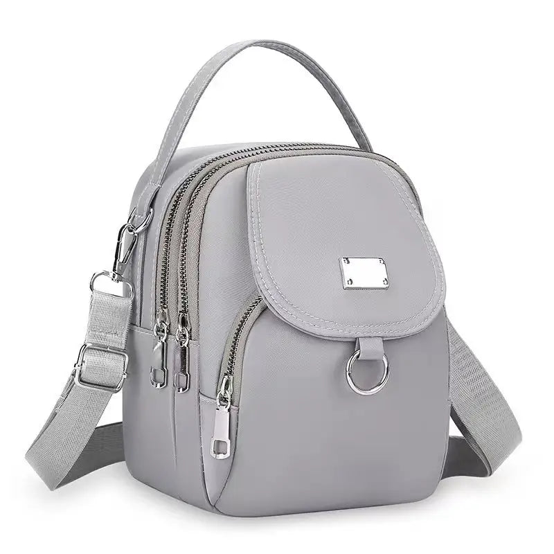 Gray nylon crossbody bag made from durable Oxford cloth for stylish cloth handbag