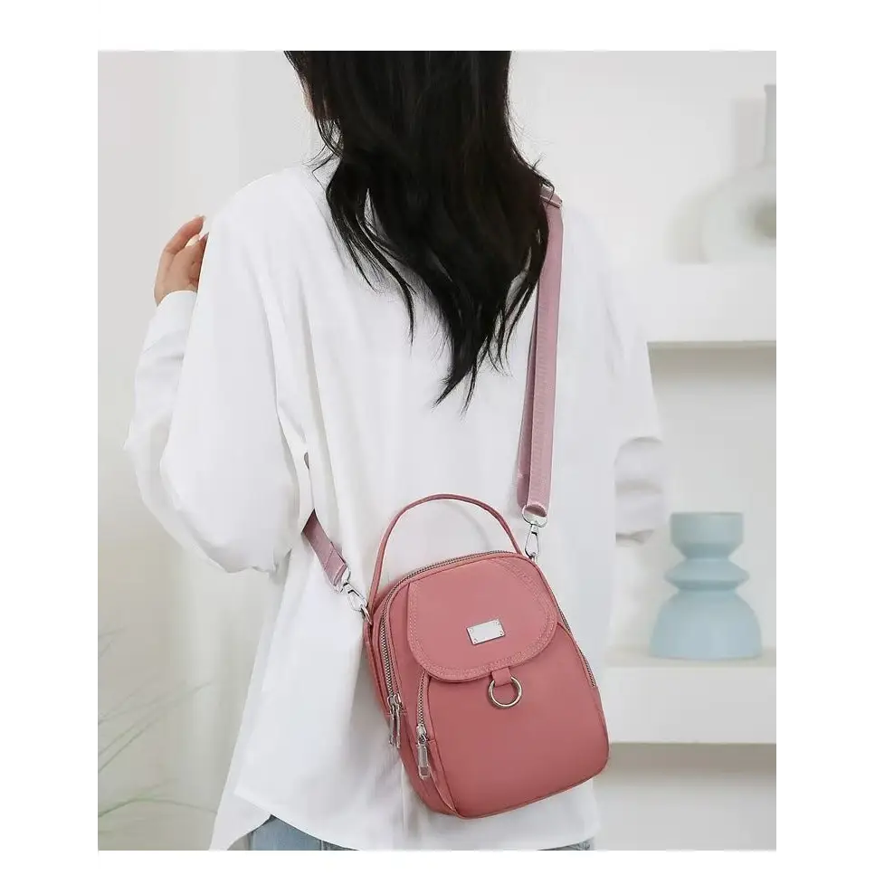 Pink crossbody bag made of Oxford cloth, stylish Oxford cloth handbag for women