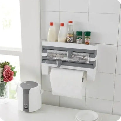 Wall-mounted kitchen organizer with foil, wrap, and paper towel dispensers for efficient storage