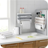 Kitchen organizer with dispenser for paper towels and foil in modern kitchen setting