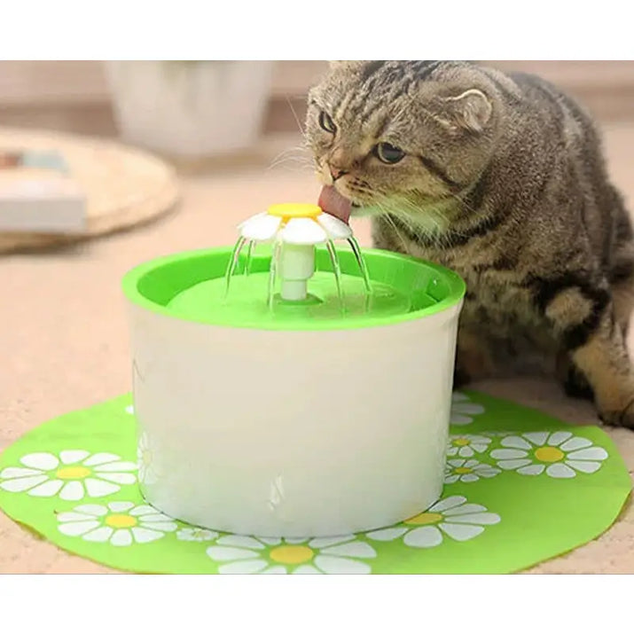 Cat drinking from a Daisy-Shaped Water Fountain with Pet Fountain Filters installed