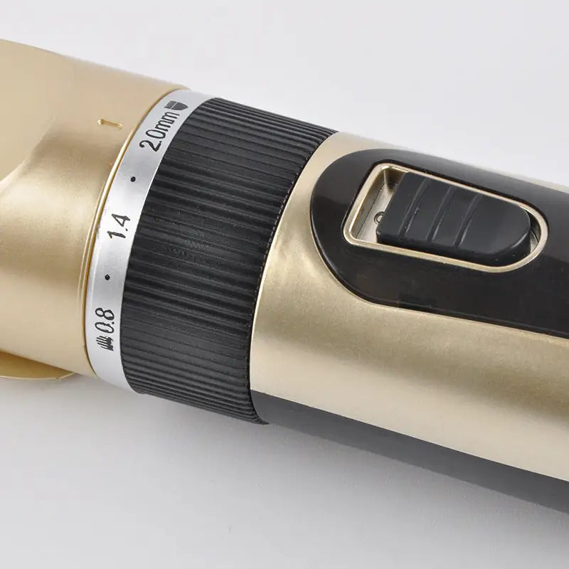 Gold and black pet hair shaver trimming grooming tool for pesky pet hair removal